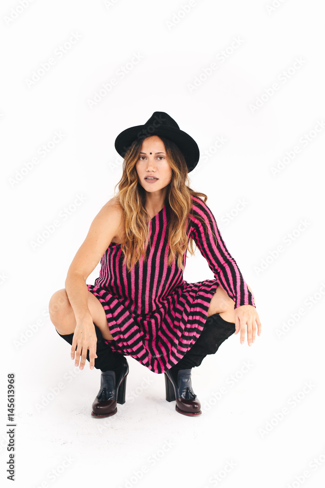 Full body portrait of young woman, isolated over white background Full body portrait of young woman, isolated over white background