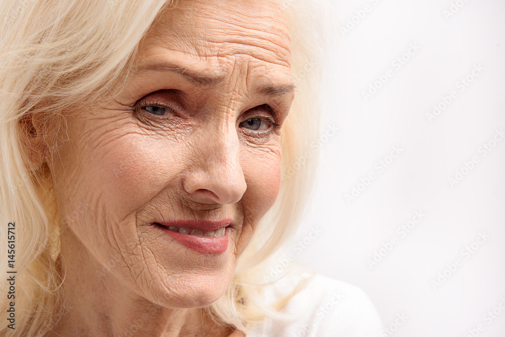 Old female person glancing curiously Old female person glancing curiously