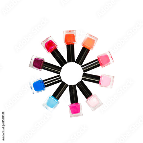 colorful nail polishes isolated on white background