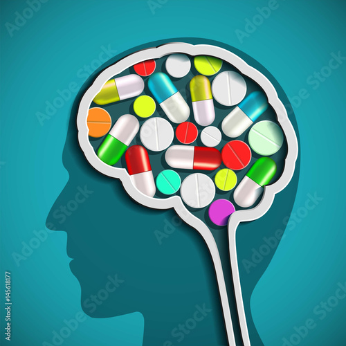 Human head with the brain and pills.