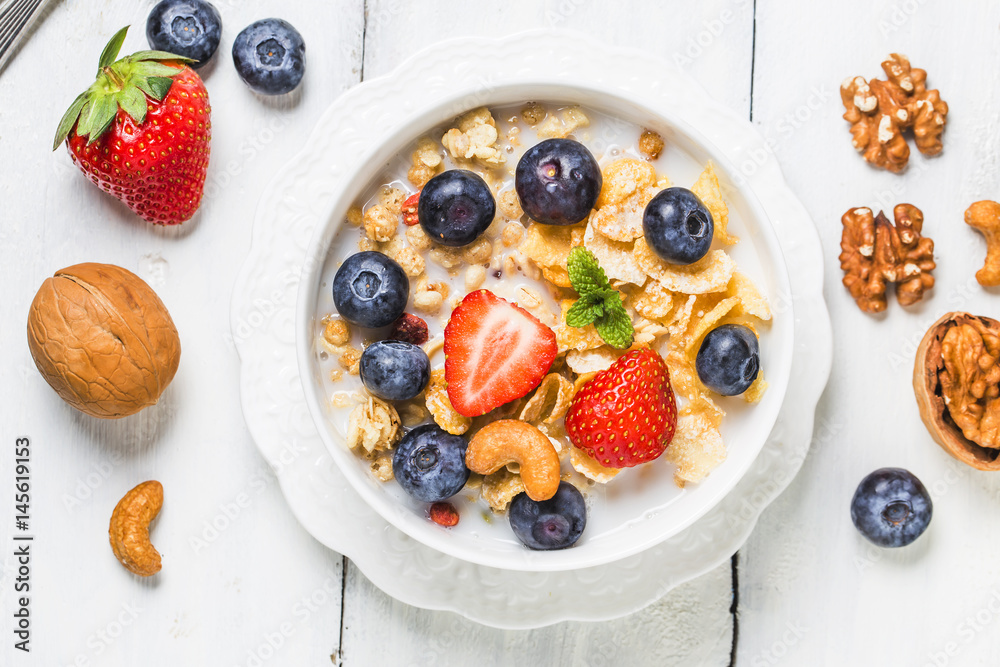 crunchy flakes with blueberries and various yogurts for healthy breakfast crunchy flakes with blueberries and various yogurts for healthy breakfast