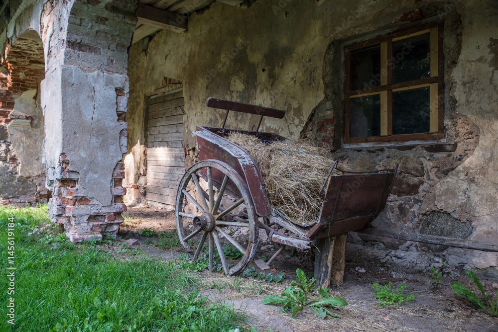 Old broken wooden wagon. Igates Pils, Latvia