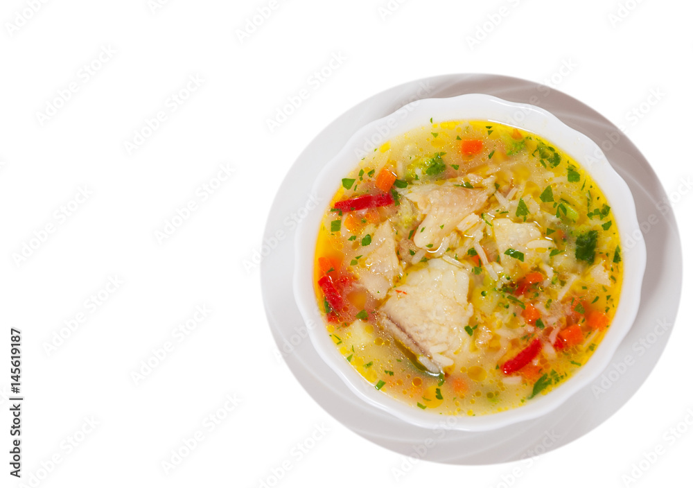 Fish soup with vegetables and rice. top view. isolated on white Fish soup with vegetables and rice. top view. isolated on white