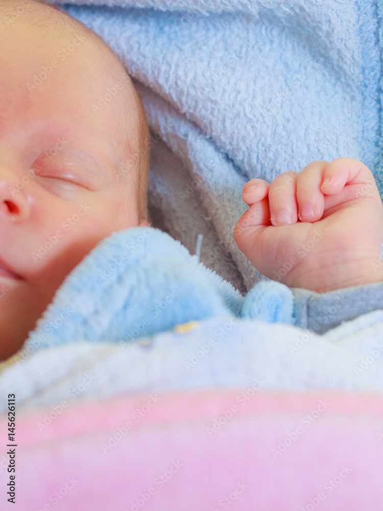 Little newborn baby sleeping calmly in blanket Little newborn baby sleeping calmly in blanket