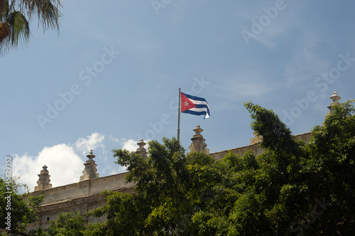 Cuban flag on a building at Havana city, Republic of Cuba photo