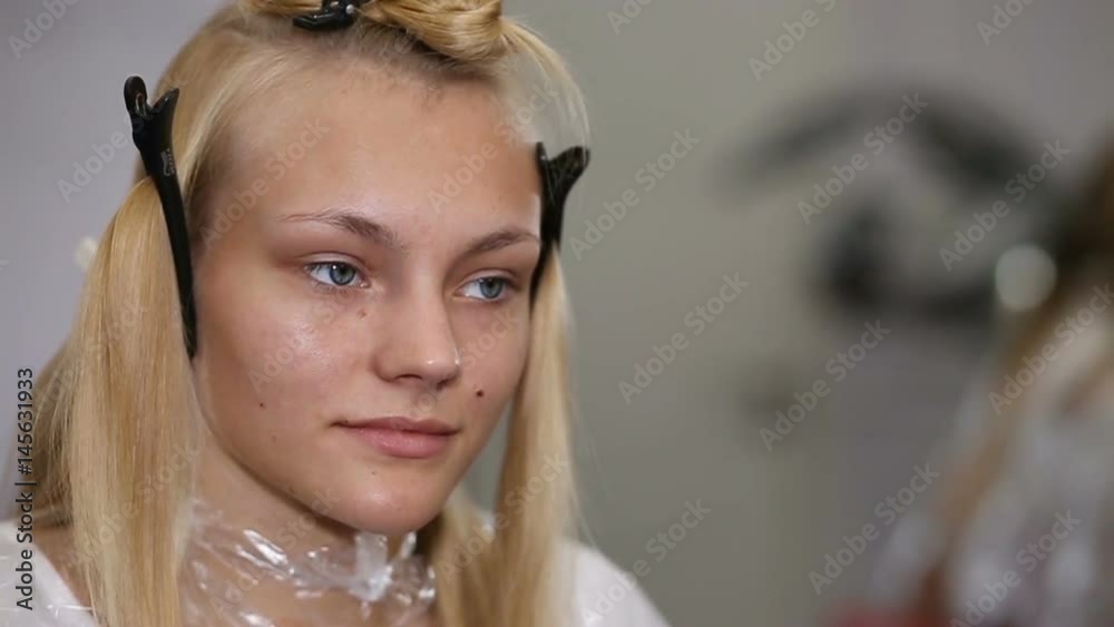 A woman having her haircut in hair studio A woman having her haircut in hair studio