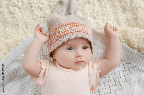 Cute little baby lying on p...