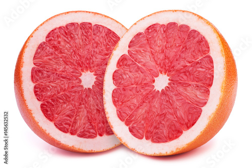 Perfectly retouched sliced halfs of grapefruits isolated on the white background with clipping path
