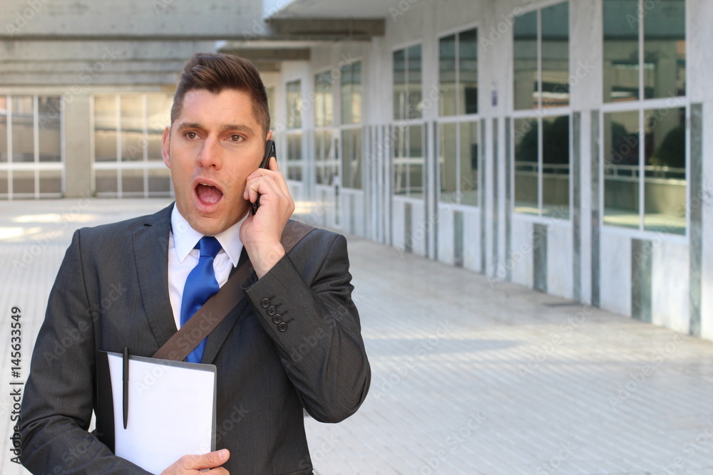 Closeup portrait shocked businessman, employee talking on cell phone having unpleasant conversation, - Stock image Closeup portrait shocked businessman, employee talking on cell phone having unpleasant conversation, - Stock image