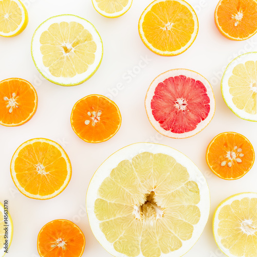 Food pattern of fresh citrus on white background. Flat lay, top view.