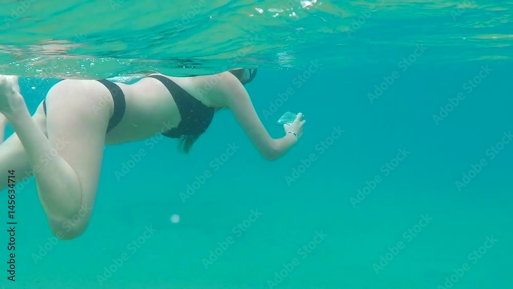 Woman snorkeling in amazing sea Woman snorkeling in amazing sea