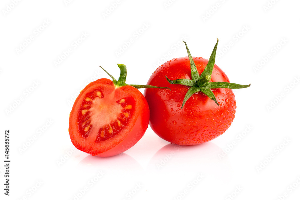 tomatoes with water drops isolated on the white background tomatoes with water drops isolated on the white background
