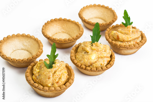 Portion appetizer of tartlets with fish paste