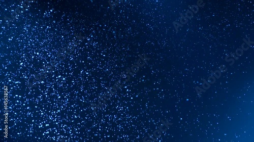 Beautiful snowflakes are falling in the blue night sky, falling snow. Stage set in a drama performance