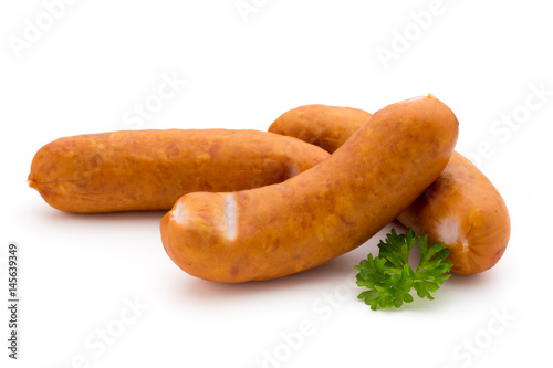 Sausage and spices isolated on white background, fresh delicious frankfurter.