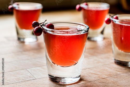 Cranberry cocktail shot with vodka