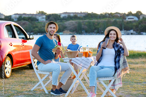 Happy family on picnic outd...