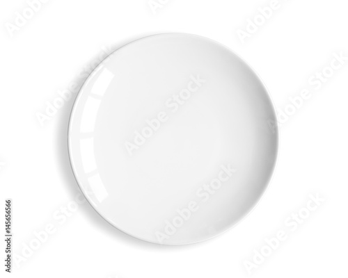 Slika na platnu Top view of blank white dish on a white background.