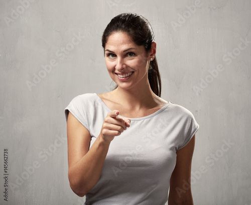 Woman pointing to the camera