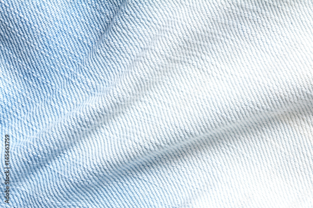 Close up denim bright  blue jeans surface with wave texture background