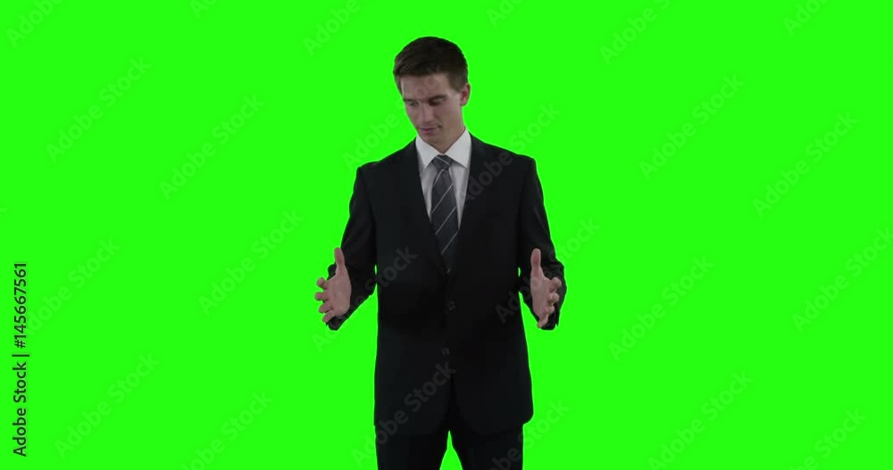 Businessman pretending to be hold invisible object