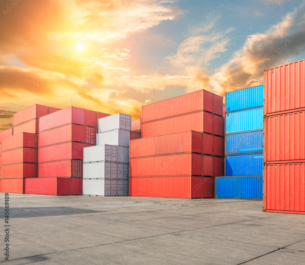 Fototapeta premium Industrial port container terminal at sunset