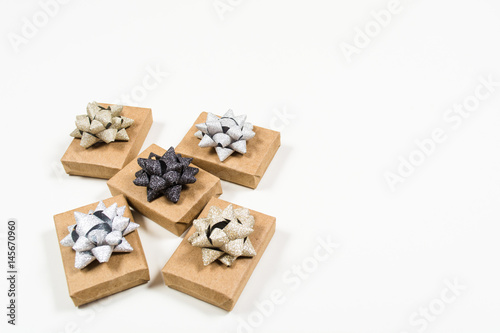 Holiday wrapped gifts with bows