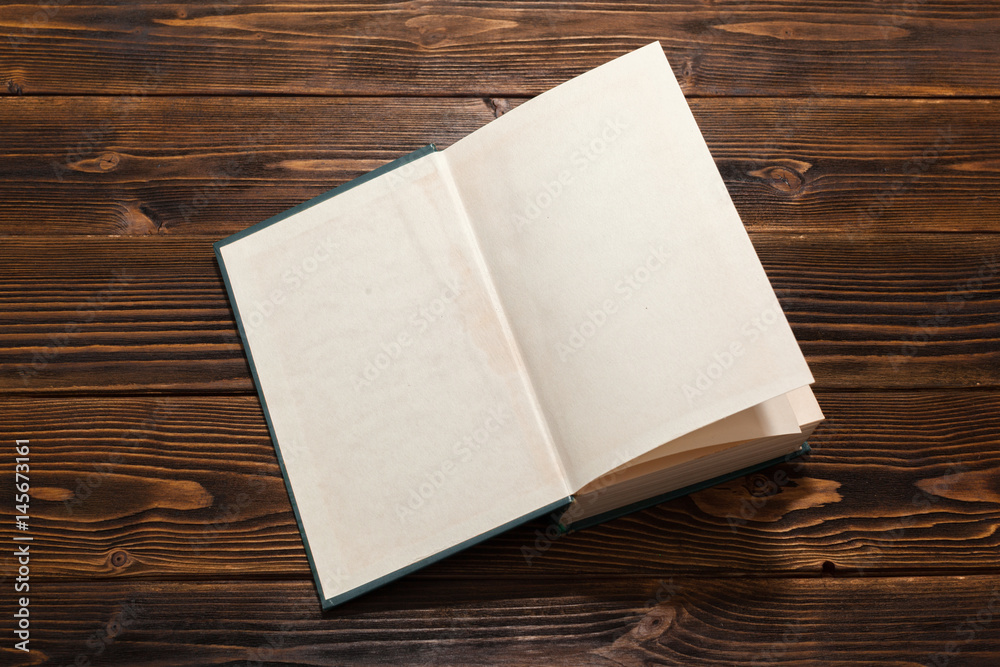 Book on wooden table. top view Book on wooden table. top view