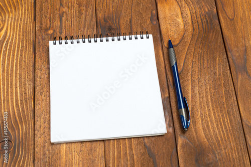 Blank Papers and Pen on Wooden Table © fotofabrika