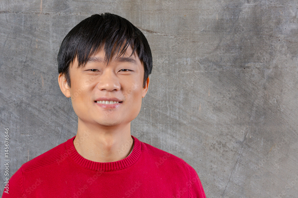 Handsome young asian man smiling Handsome young asian man smiling