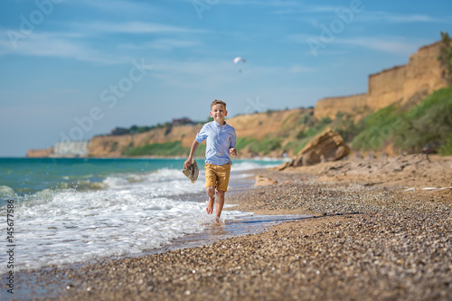 fashion boy on the beach