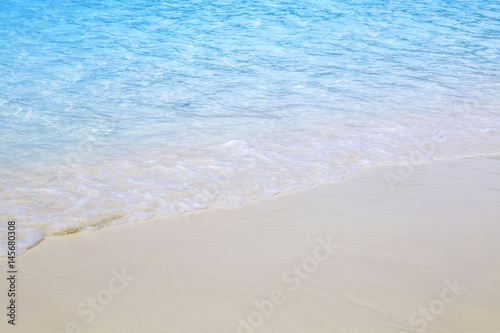 Beautiful beach and tropical sea with Soft wave 