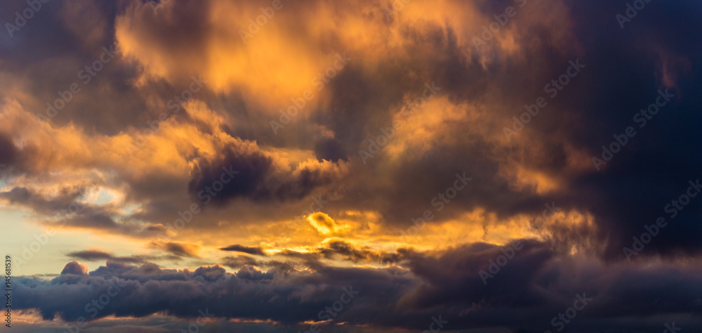 dark dramatic clouds. background panorama of a stormy sky dark dramatic clouds. background panorama of a stormy sky