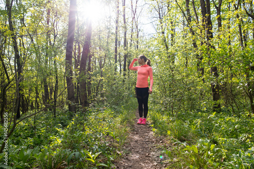 Runner girl green spring forest