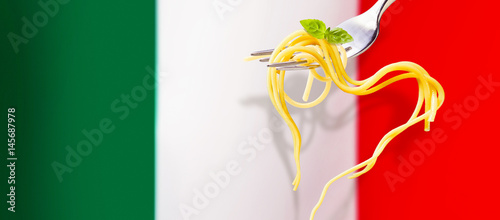 Heart shaped spaghetti over the Italian flag