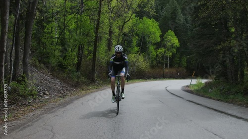 Wallpaper Mural Man road biking through mountains Torontodigital.ca
