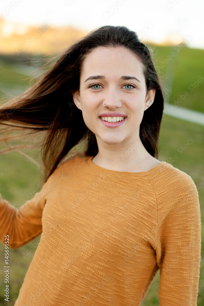 Outdoor portrait of beautiful happy teenager girl laughing Outdoor portrait of beautiful happy teenager girl laughing