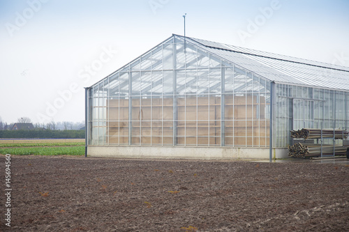 Glass house in agricultural landscape © gigra