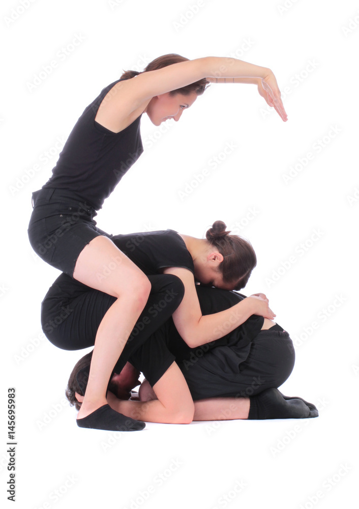 Black dressed people forming number six on white Black dressed people forming number six on white