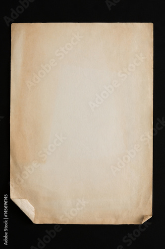 old craft paper sheets pile isolated on black background