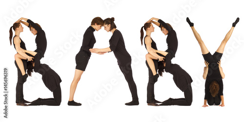 Black dressed people forming word BABY photo