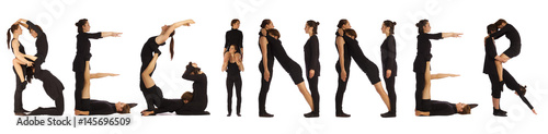 Black dressed people forming word BEGINNER