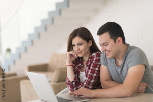 happy young couple buying online