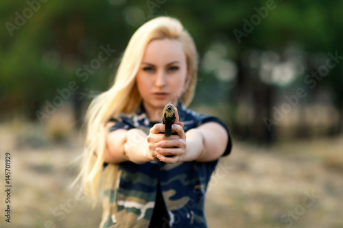 Beautiful woman ranger with gun © Taranukhin Alex