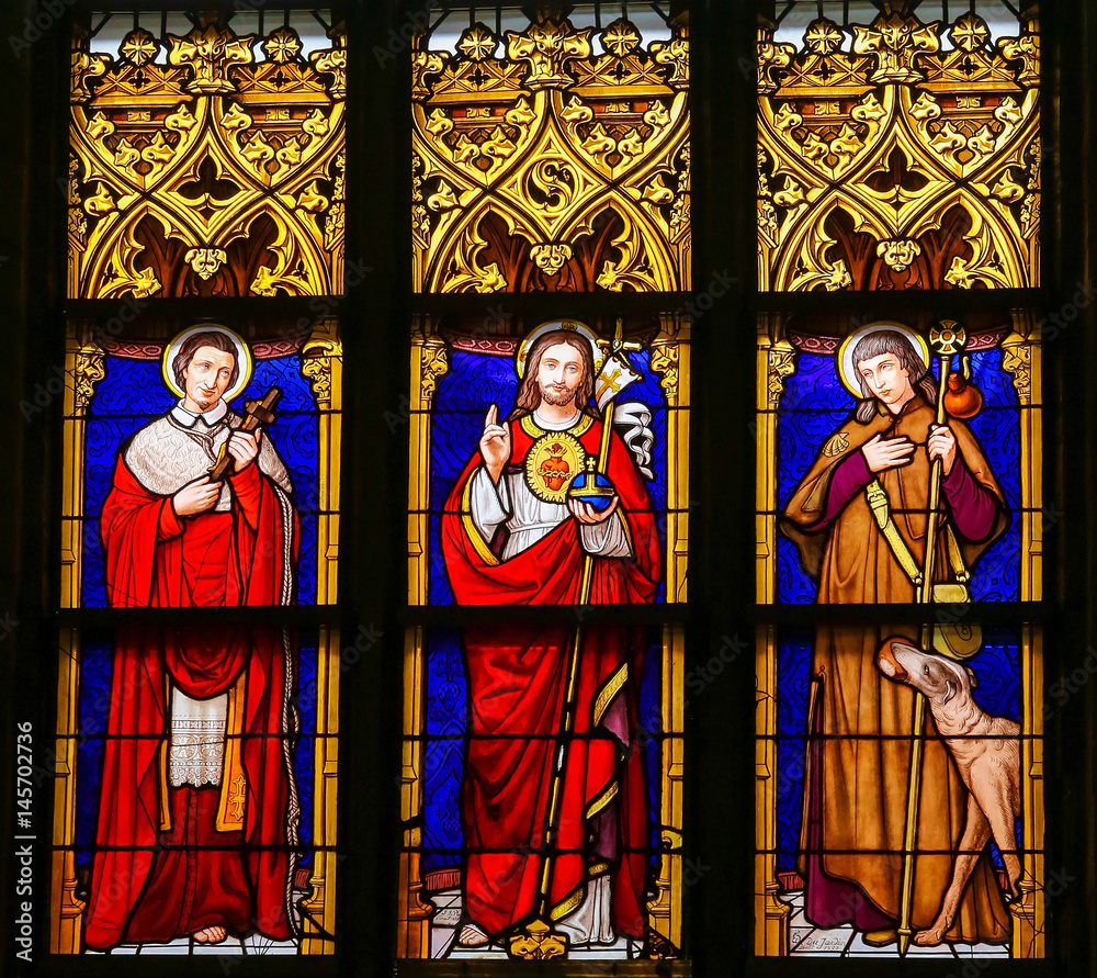 Fototapeta premium Stained Glass - Jesus Christ, Saint Roch and Saint Charles Borromeo