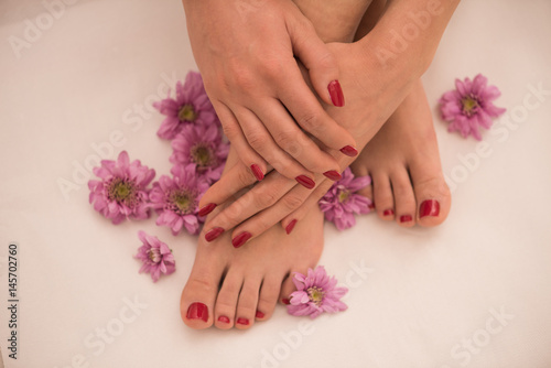 female feet and hands at spa salon © .shock
