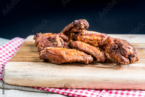 delicious fried chicken wings with sauce