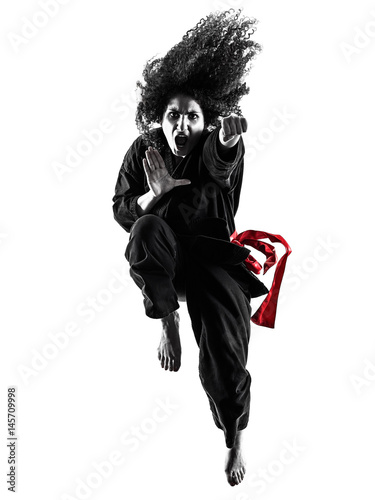 one caucasian woman practicing martial arts Kung Fu Pencak Silat in studio isolated on white background