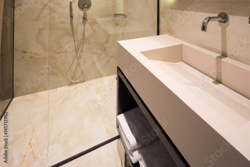 faucet and sink in a Modern luxury hotel bathroom interior