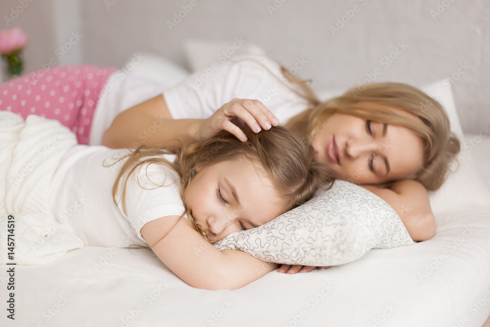 mother put her daughter to sleep. Interior. Concept care